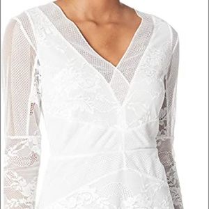 BCBG MaxAzria mixed lace peplum blouse